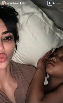 Kim Kardashian and Saint West cuddled up together in a sweet moment shared on Instagram