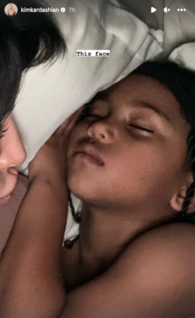 Saint West sleeping peacefully beside his mother, Kim Kardashian.