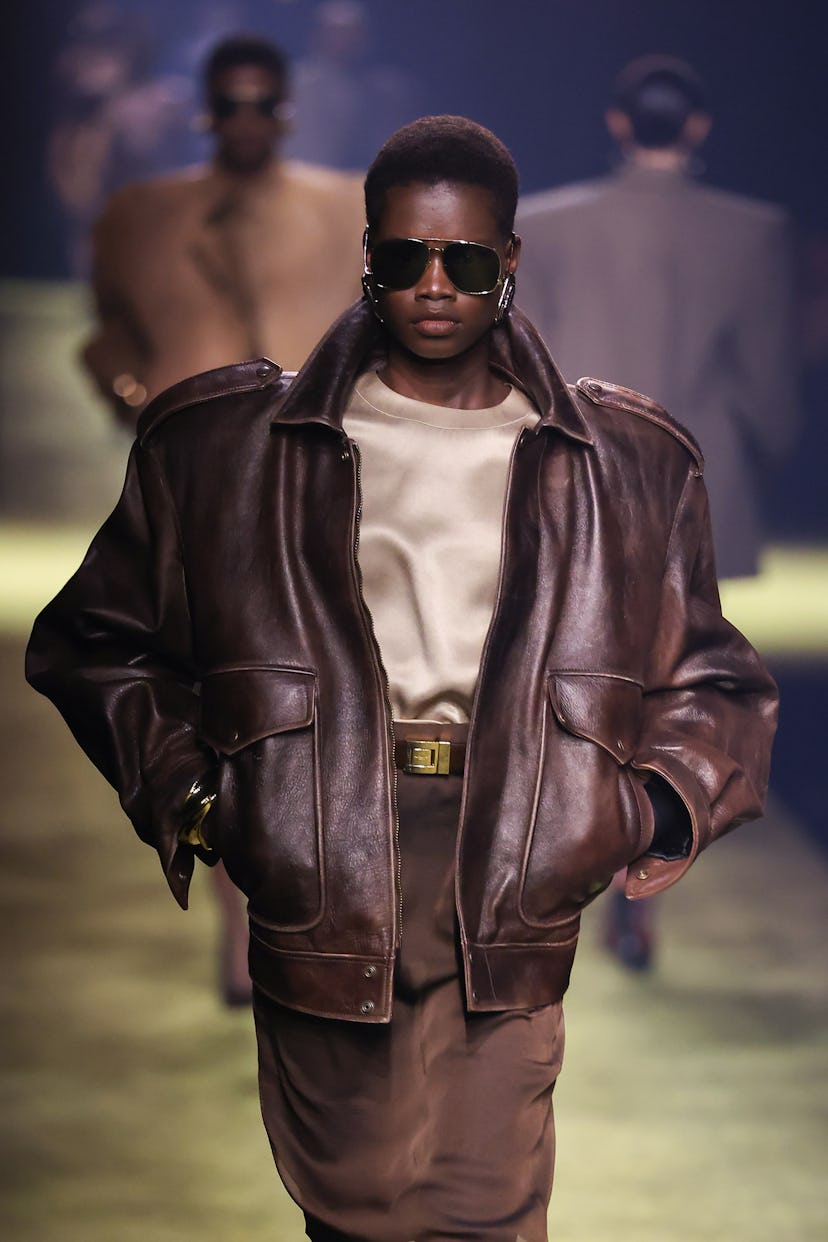 A model walks the runway at Saint Laurent