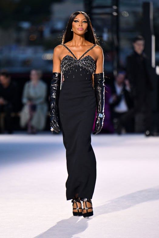 Naomi Campbell walks the runway during the Versace Fall/Winter 2023 fashion show