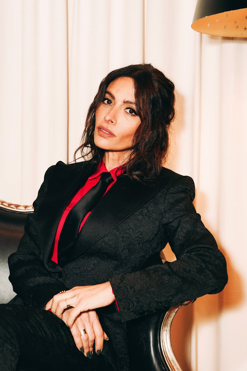 A portrait of Sarah Shahi