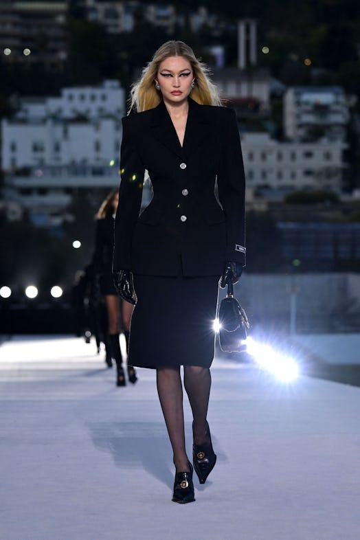 US model Gigi Hadid walks the runway during the Versace Fall/Winter 2023 fashion show 