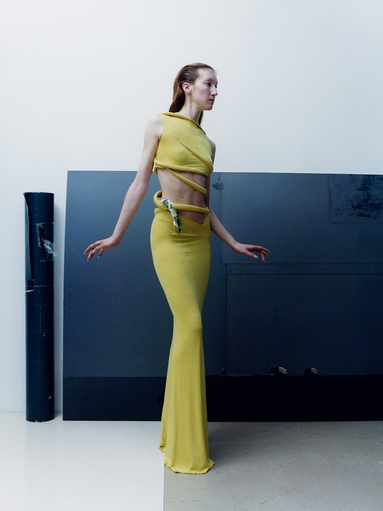Model Lorna Foran wears yellow dress.