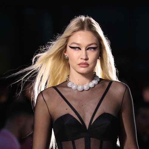 gigi hadid walking the versace f/w '23 fashion show