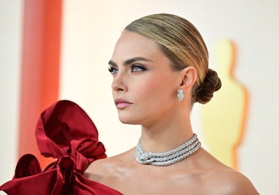Cara Delevingne attends the 95th Annual Academy Awards 