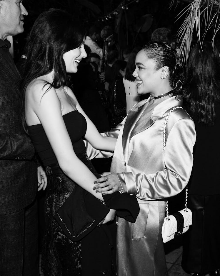 Camila Morrone and Tessa Thompson at Chanel and Charles Finch’s pre-Oscar awards dinner at the Polo ...