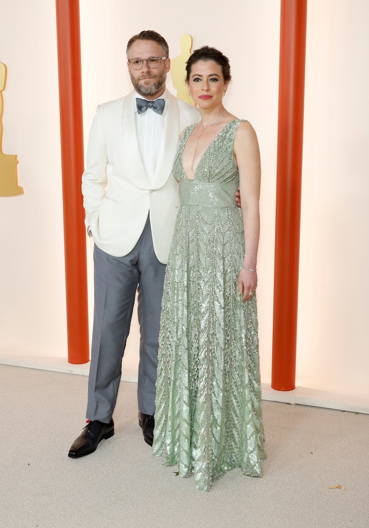 Seth Rogen and Lauren Miller attend the 95th Annual Academy Awards on March 12, 2023 in Hollywood, C...