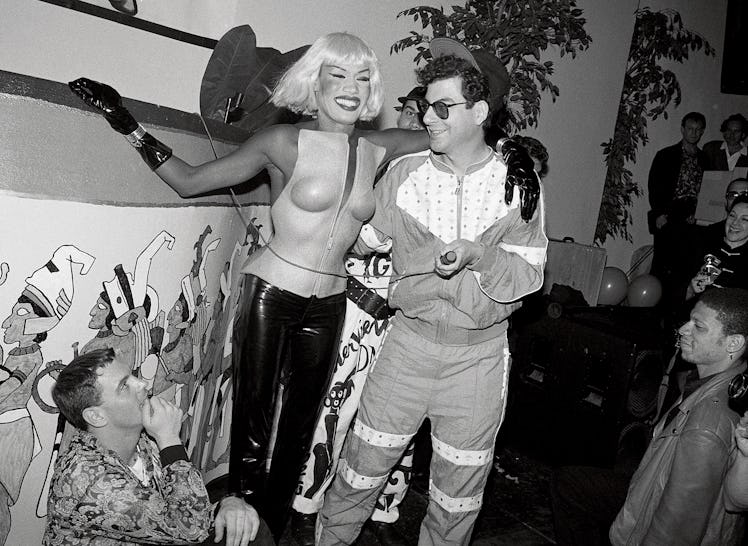 Grace Jones & Michael Musto parties together.