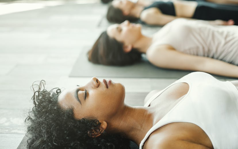 How long to stay in savasana yoga pose, according to the pros.
