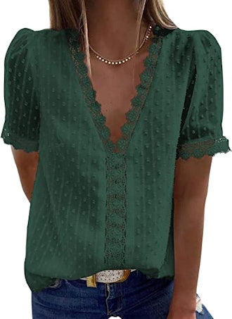 If you're looking for cute clothes that look good on everybody, consider this lace-trimmed tunic mad...
