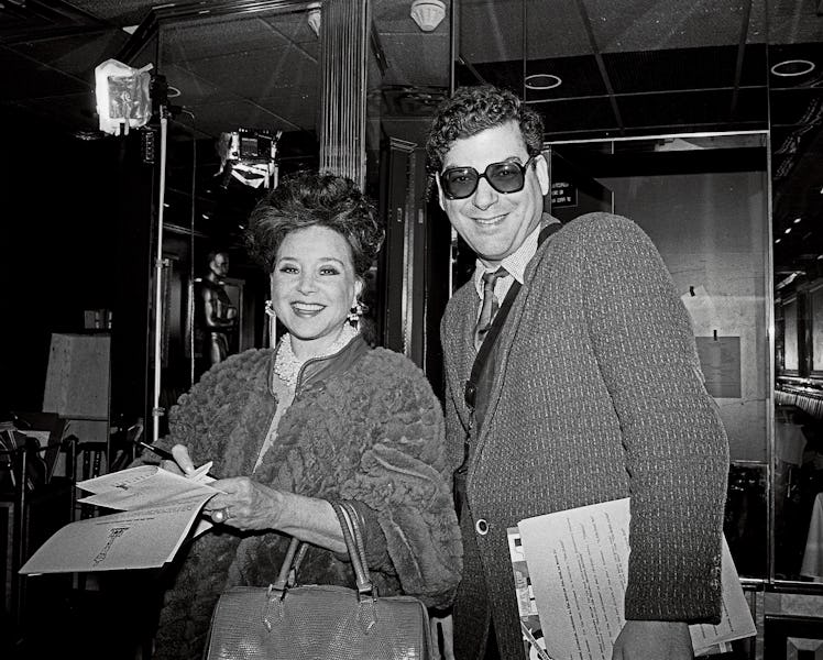 Cindy Adams and Michael Musto poses for the camera.
