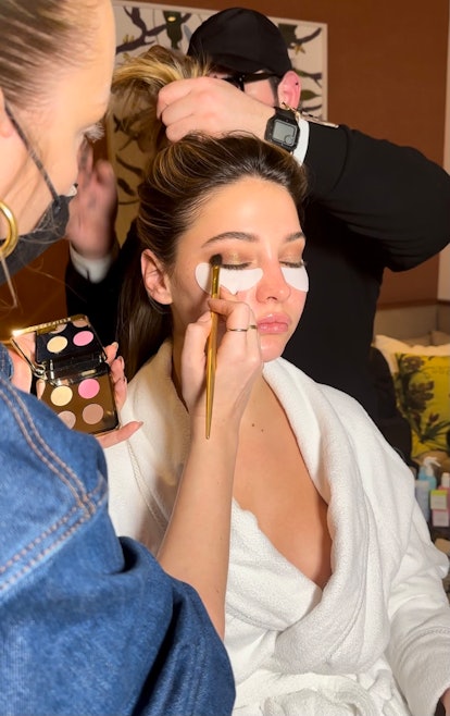 Makeup artist Jen Tioseco doing Madelyn Cline's 2023 Oscars After Party makeup 