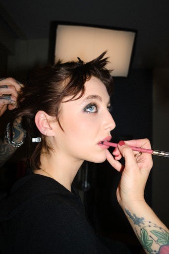 Emma Chamberlain at the 2023 Vanity Fair Oscar Party with emerald green Lancome eyeshadow and micro &hellip;