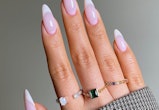 The vanilla French manicure has been a huge 2023 nail trend that Kylie Jenner and Adele love.