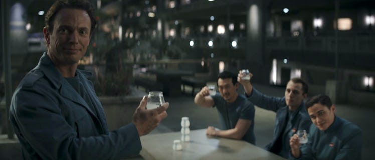 A group of former Imperials raise their glasses together in The Mandalorian Season 3 Episode 9