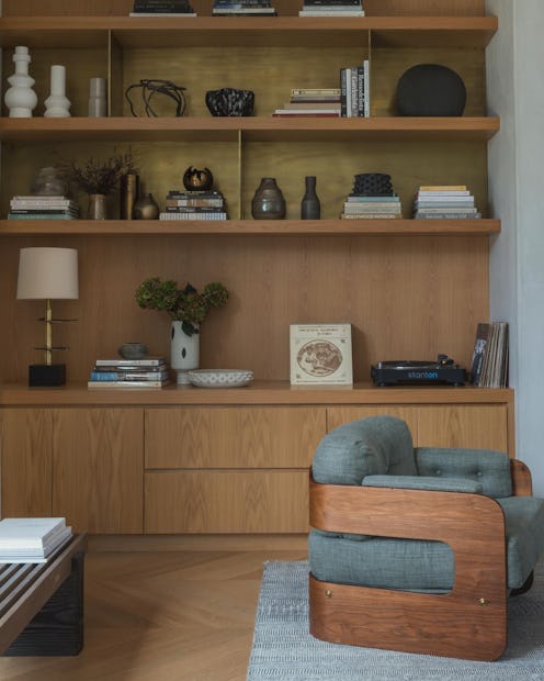 Bookshelf styled with objects and books