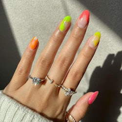 Bright pastel colors are spring 2023's top nail trend.  @amyytran