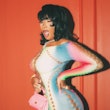 Megan Thee Stallion rainbow catsuit and bangs