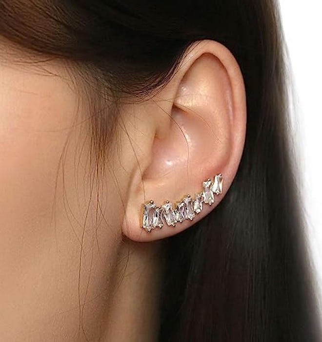 These earrings that look like multiple piercings are crawlers with jagged CZ stones.