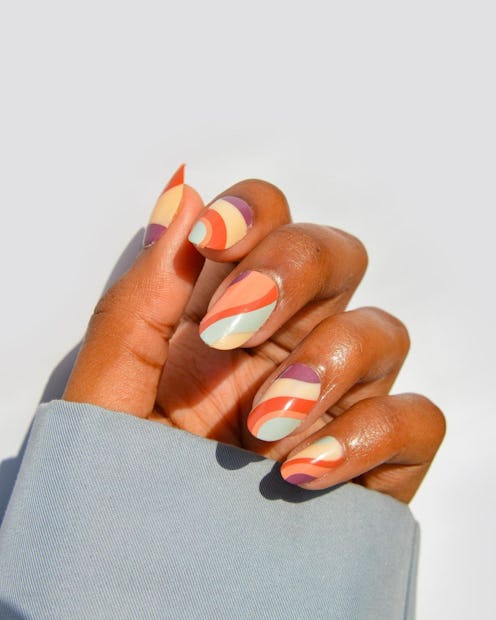 You'll see bright nail polishes everywhere in spring 2023. Here are more spring nail polish color tr...
