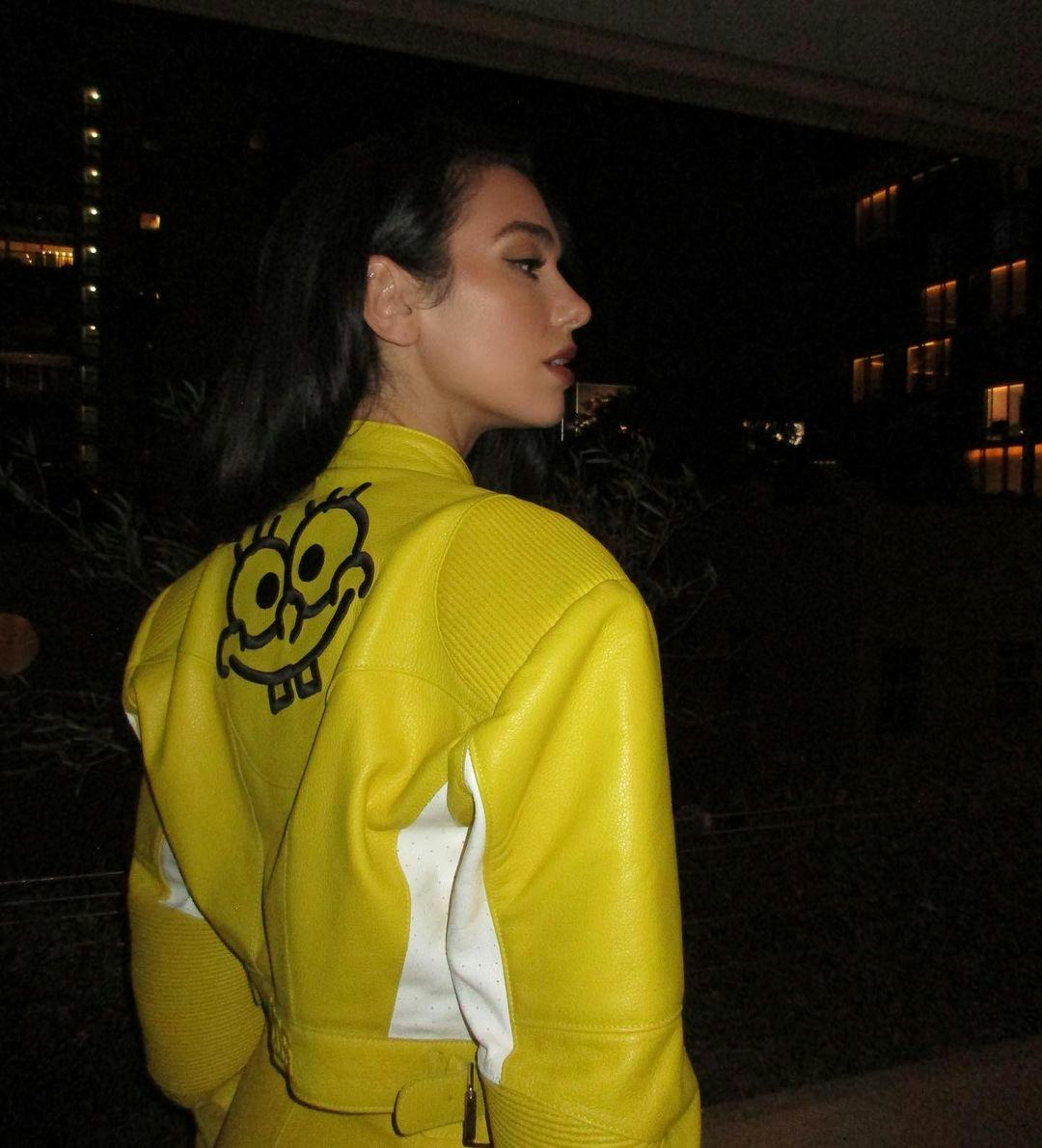 Dua Lipa Puts A Sunny Twist On The Moto Jacket Trend With Sponge Bob’s Help