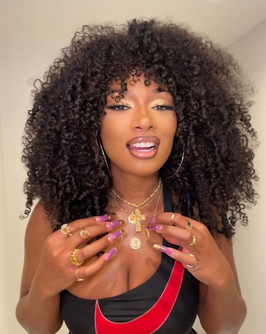 Megan Thee Stallion natural hair with curly bangs