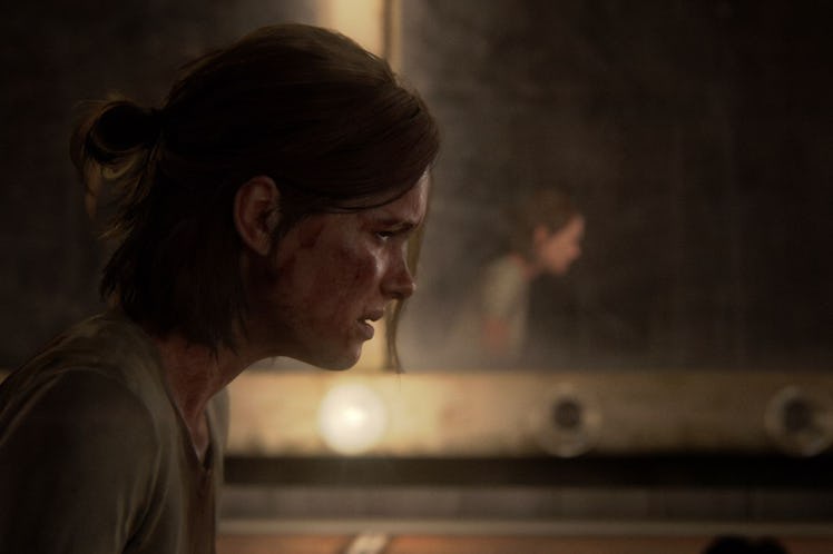 Ellie sits next to a dressing room mirror in The Last of Us Part II