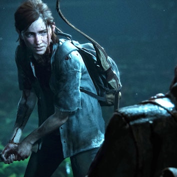 Ellie holds a machete in front of a Scar soldier in The Last of Us Part 2