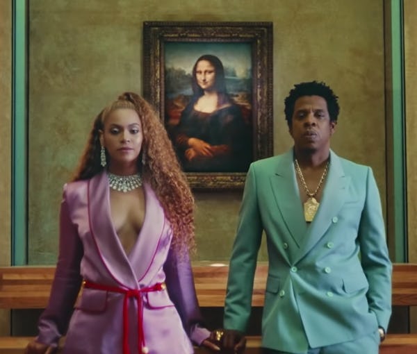 Beyoncé and Jay-Z pose together in the ‘Apesh*t’ video. Screenshot via YouTube