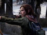 Ellie shooting an arrow in The Last of Us