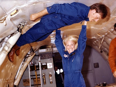 Margaret Rhea Seddon and Robert Lee "Hoot" Gibson in the training flight aboard the “vomit comet.” G...