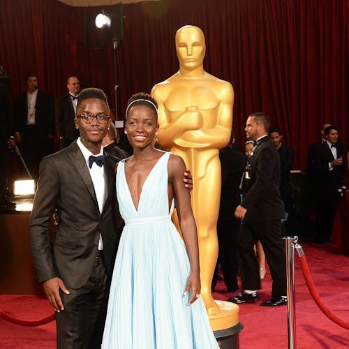 Lupita Nyong'o and brother 2014 Oscars