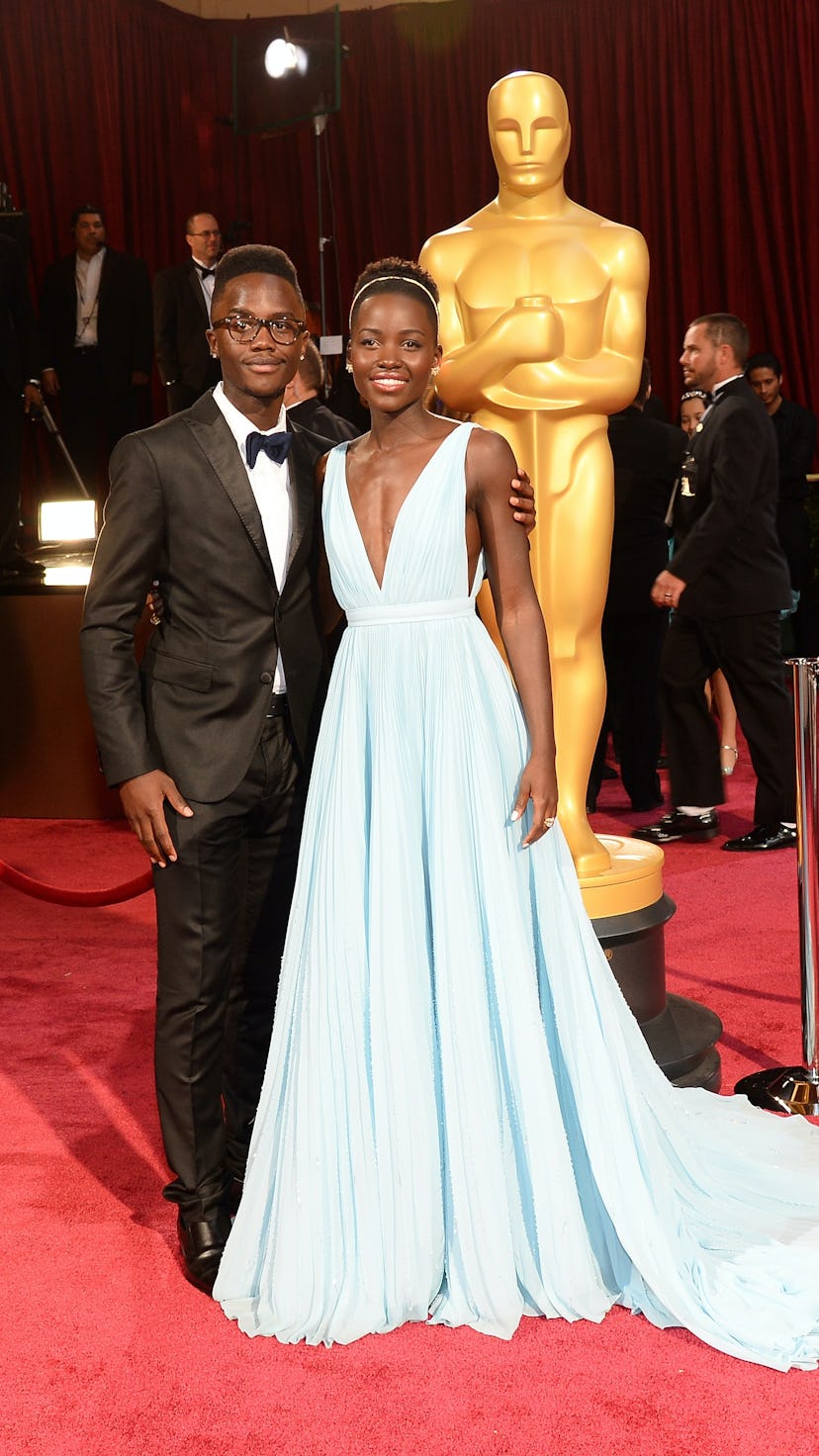 Lupita Nyong'o and brother 2014 Oscars