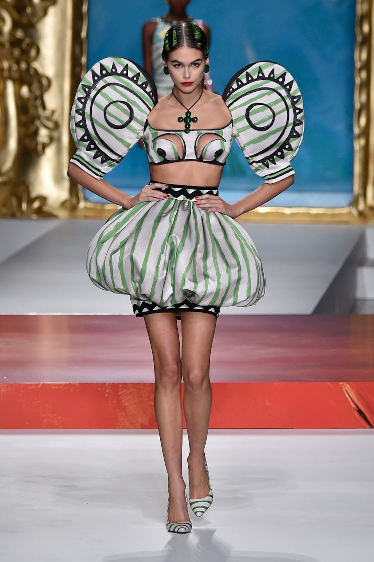 Kaia Gerber walks the runway at the Moschino show during the Milan Fashion Week Spring/Summer 2020 o...