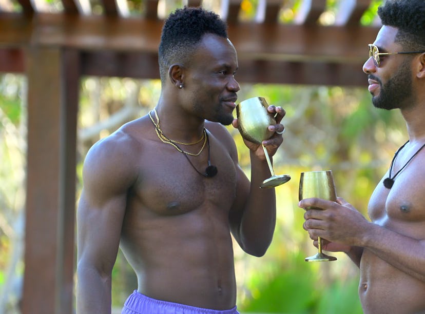 Production still of Kwame Appiah and Brett Brown on Love Is Blind Season 4.