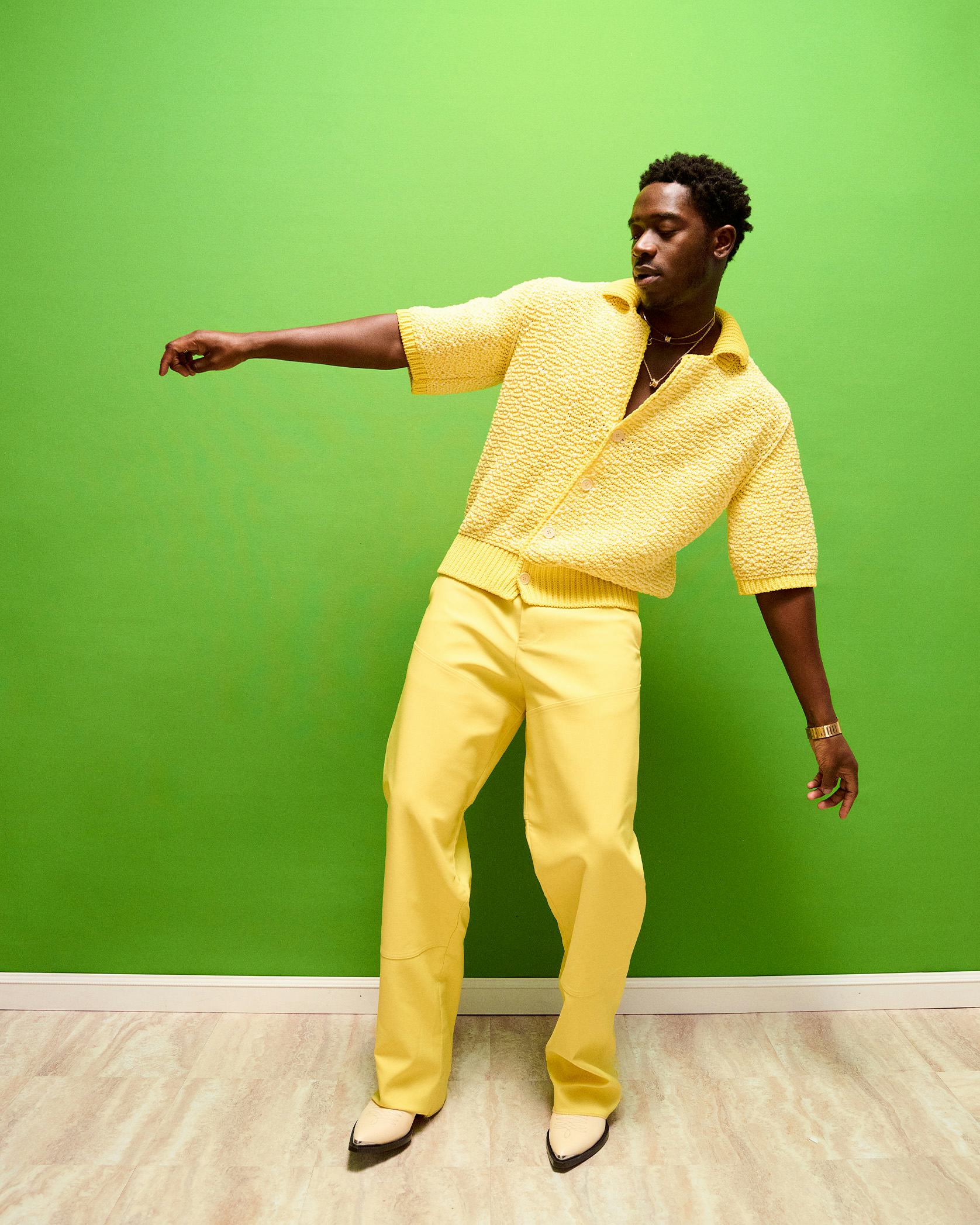Damson Idris dancing in all yellow