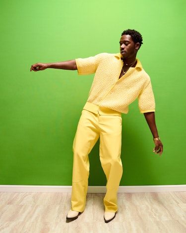 Damson Idris dancing in all yellow