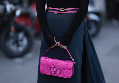 Miki Cheung seen wearing a pink Valentino bag and belt