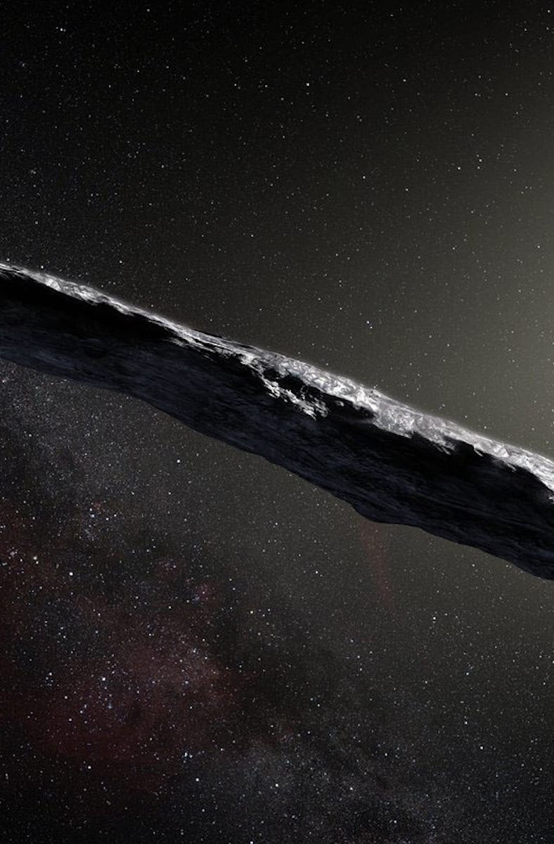 An artist's concept of a cigar-shaped, dark-hued rock drifting in space, lit by sunlight from the up...