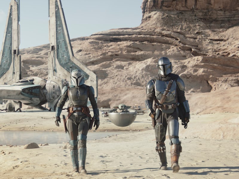 Bo-Katan, Grogu, and Din Djarin walk away from The Gauntlet in The Mandalorian Season 3 Episode 3