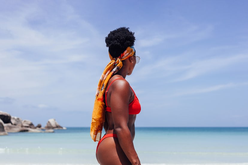 From travel braids to faux locs, here are the best beach vacation hairstyles for natural Black hair,...