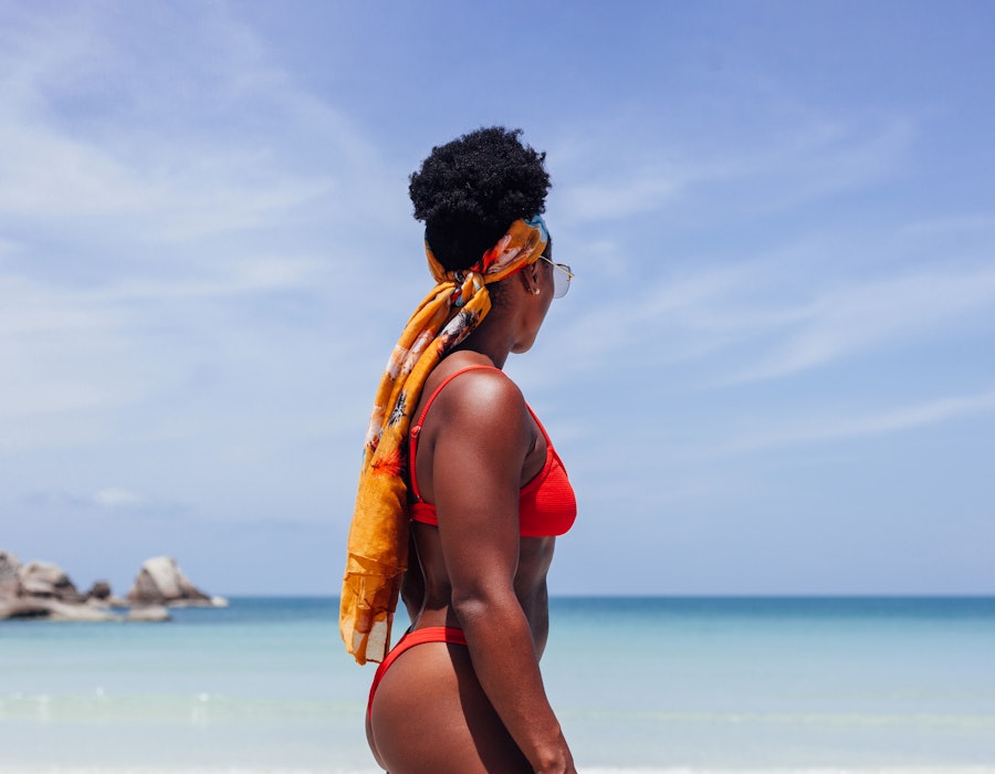 From travel braids to faux locs, here are the best beach vacation hairstyles for natural Black hair,...