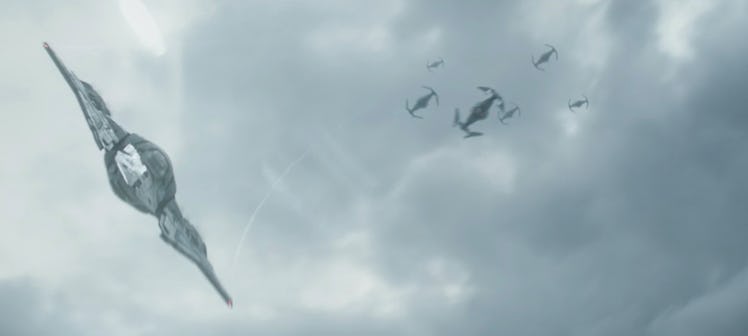 The Gauntlet flies away from a squadron of TIE Interceptors in The Mandalorian Season 3 Episode 3