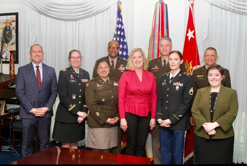 Major Winkler and her colleagues at the directive's signing ceremony in 2022.