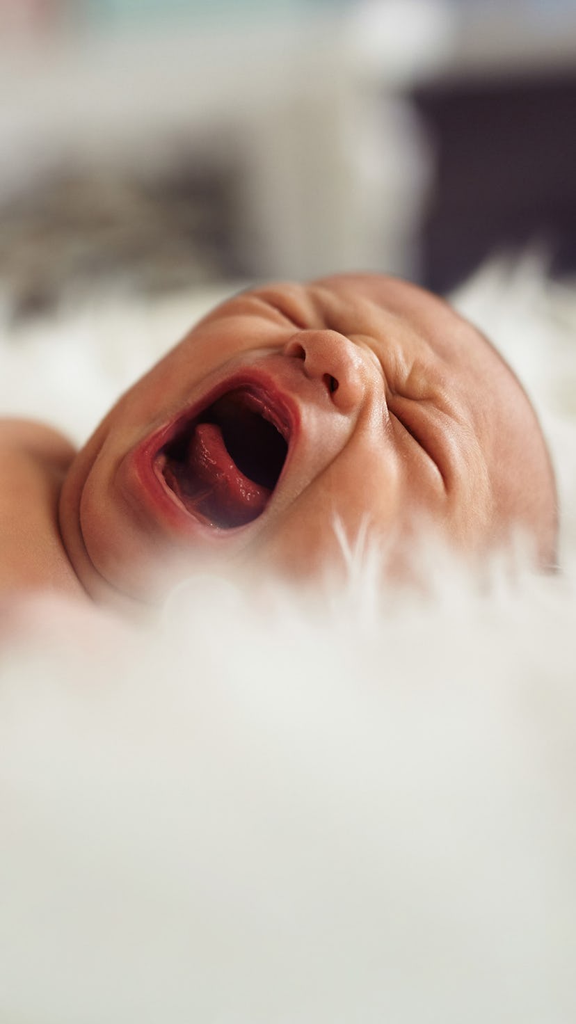 Newborn baby crying despite sleep training