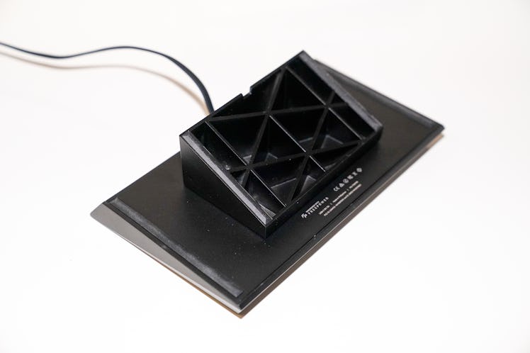 The metal stand on the Tesla Wireless Charging Platform acts as a heatsink to dissipate heat from th...