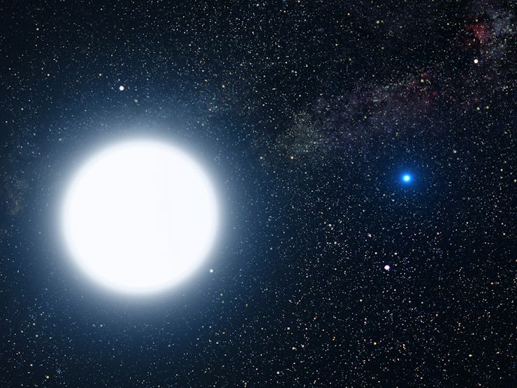 Artist's impression of the white dwarf star Sirius B (right) orbiting its companion Sirius A (left)....