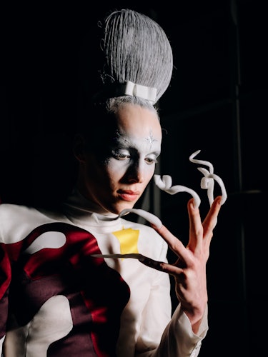 A model backstage at Thom Browne Fall 2023 Ready To Wear Fashion Show at The Shed on February 14, 20...