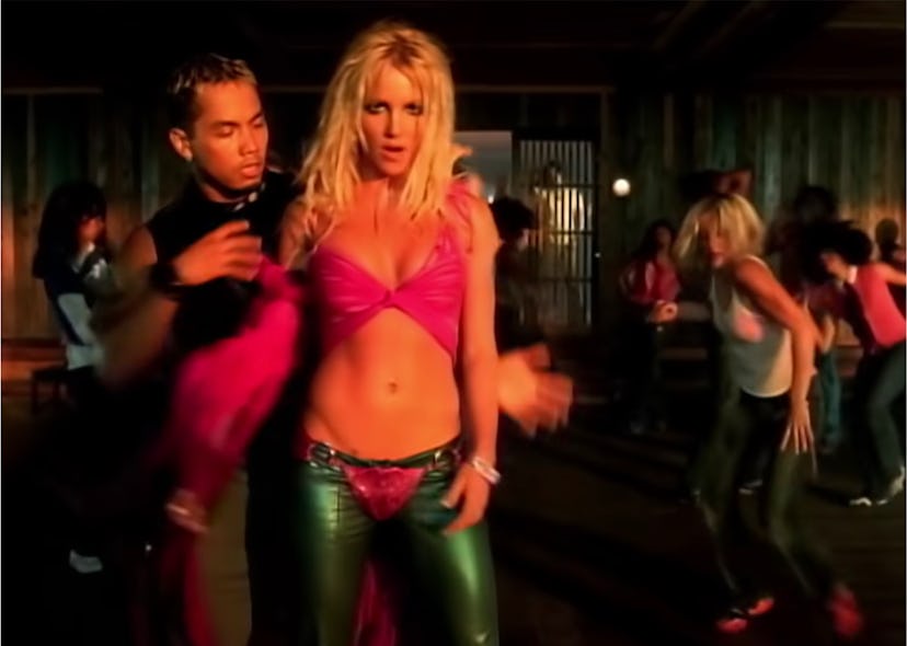 Britney Spears dancing in her "I'm A Slave 4 U" video.