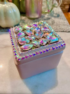 This bejeweled trinket box is 'Midnights' era home decor inspired by Taylor Swift. 